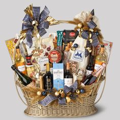 a basket filled with lots of different types of wine