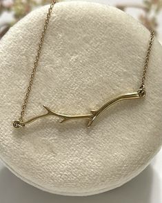 Item Specifications Handmade Yellow Gold This Beautiful Branch Necklace is a unique piece.This would be the perfect gift for any occasion, from wedding anniversaries, to Mother's Day, to graduations and Birthdays ,it's a solid gold  crafted in 14k yellow gold. Branch necklace is a nature-inspired jewelry featuring a pendant designed to resemble the delicate and intricate structure of a tree branch. Pendant measurements: 37mm x 8.5mm Chain Style : Cable chain , spring ring closure Chain measureme Unique Gold Necklace For Mother's Day, Gold Nature-inspired Necklaces For Mother's Day, Unique Necklace With Clavicle Chain For Gift, Unique Clavicle Chain Necklace For Gift, Unique Necklace For Gift, Gold Nature-inspired Necklace For Gift, Nature-inspired Necklace With Adjustable Chain As Gift, Nature-inspired Necklace With Adjustable Chain For Gift, Nature-inspired Yellow Gold Necklace As A Gift