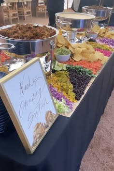 a table topped with lots of different types of food