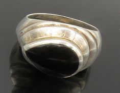 925 Sterling Silver - Vintage Tear Drop Black Onyx Cocktail Ring Sz 7 - RG15399  925 Sterling Silver - Vintage Tear Drop Black Onyx Cocktail Ring Sz 7 - RG15399  Jewelry Type:         Ring  Metal Type:            925 Silver  Metal Size:             7 Finger  Stone Type:            Onyx   Condition:              N/A  Jewelry Weight:     8 Grams  PLEASE NOTE: THIS ITEM IS PRE-OWNED. ALTHOUGH MOST ITEMS ARE IN VERY GOOD CONDITION, SOME MAY NEED CLEANING AND/OR MINOR REPAIRS. WE MAKE A VERY STRONG E Black Modernist Jewelry For Anniversary, Dope Jewelry, Ring Metal, Dream Ring, Fashion Accessories Jewelry, Tear Drop, Cocktail Ring, Cocktail Rings, Black Onyx