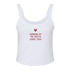 someone at tri delta loves you tank top in white with red lettering on the chest