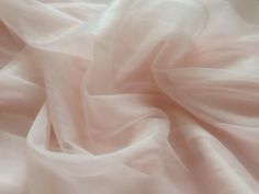 the fabric is soft and light pink