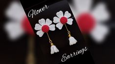 two crocheted flower earrings with dangling hooks in red, white and yellow colors