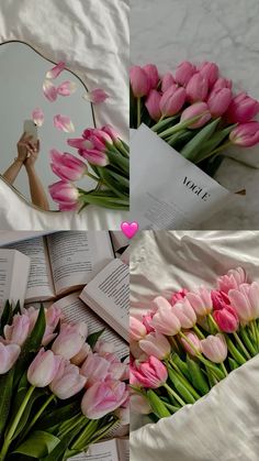 pink tulips in front of a mirror and an open book on a bed