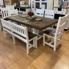 a kitchen table and chairs in a store