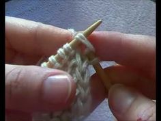 someone is crocheting the end of a piece of yarn