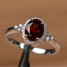 This Beautiful Ring Rivals The Most Perfect Ruby Or Garnet. Beautiful White Accent Stones Surround The Beautiful Oval Stone. 18k Gold Plated. Blue Wedding Rings, Wedding Party Accessories, Versatile Jewelry, Rings For Girls, Engagement Bands, Elegant Ring, Garnet Rings, Jewelry Wedding