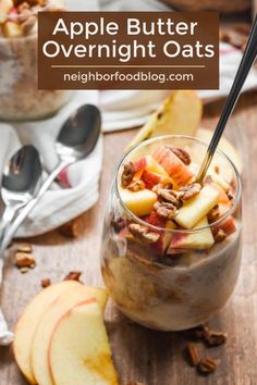 apple butter overnight oats in a glass with spoons and apples on the side