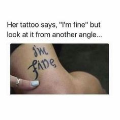 a woman with her tattoo saying i'm fine but look at it from another angle