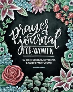 the cover of prayer journal for women with flowers and leaves around it, on a black background