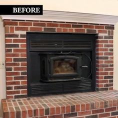 an old brick fireplace has been painted black