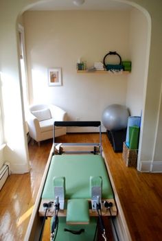 a room with some exercise equipment in it