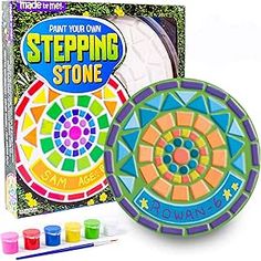 this is an image of a stepping stone game with paint and markers on the board