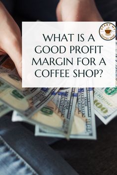 a person holding money with the words what is a good profits margin for a coffee shop?