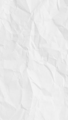a piece of white paper that has been wrinkled