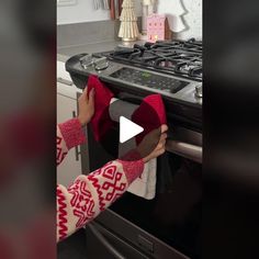 a woman is opening the oven door to check out her new oven mitts and sweater