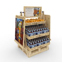 a display case with oranges and bottles of water in front of a white background