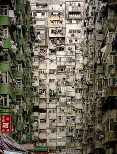 an old building with lots of windows and balconies