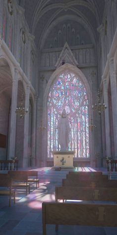 the inside of a church with stained glass windows and pews in front of it