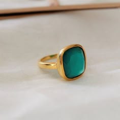 D E T A I L S - Material: 925 Sterling silverStone: Green OnyxThe fit: True to US ring size Finish: Smooth and Gold Plated to a high shineS H I P P I N G & P R O D U C T I O N - My current production time is 2-6 business days, which means after those days are up, your order ships! I make everything custom to order, by hand, but I promise you it's worth the wait!R U S H - M Y - O R D E R -If you're in a rush to get your pretty new pieces, please send me a message and I'll let you know just ho Classic Adjustable Green Ring, Green Turquoise Ring As A Gift, Green Turquoise Ring For A Gift, Green Turquoise Ring For Gift, Classic Green Turquoise Ring For Gifts, Ring Everyday, Ring Square, Chalcedony Ring, Zierlicher Ring