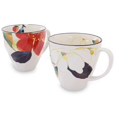 two coffee cups with floral designs on them