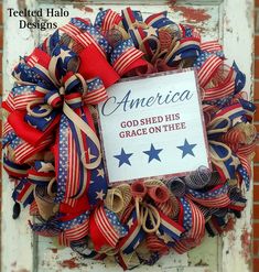 a patriotic wreath with the words america god shed his grace on thee