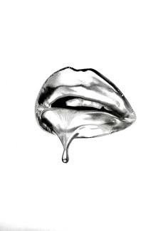 a black and white photo of a drop of liquid