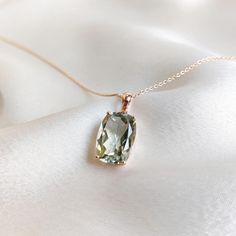 This stunning pendant is set in 14k Solid Rose Gold with Natural Green Amethyst with utmost precision. It is an unique gemstone pendant for nearly every occasion and is completely hassle-free jewelry. 🔷ABOUT GEMSTONE Green amethyst, also known as prasiolite, is a captivating variety of amethyst renowned for its ethereal, mint-green hue. This enchanting gemstone is celebrated for its connection to the heart chakra, making it a symbol of spiritual growth, compassion, and renewal. Green amethyst i Heirloom Necklace, Green Amethyst Jewelry, Mint Necklace, Handmade Jewelry Box, Amethyst Gem, Birthday Wish, Bezel Pendant, Birthstone Pendant, Amethyst Jewelry