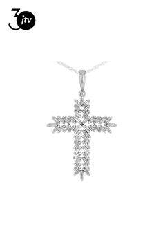 0.50ctw baguette white diamond, rhodium over sterling silver cross pendant. Suspends from an 18 inch rope chain with a spring ring clasp closure. Measures approximately 1 & 1/4"L x 13/16"W and has a 2.50mm bail. Silver Cross Jewelry, Sterling Silver Cross Pendant, Silver Cross Pendant, Cross Jewelry, Sterling Silver Cross, Silver Cross, Rope Chain, Spring Rings, White Diamond