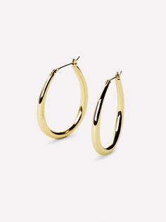 Created in collaboration with Sarah Therese With a clean, pared-down aesthetics, these gorgeous gold hoop earrings can be worn to any and every occasion. Created from hand-drawn designs by Sarah Therese, the Cuidado earrings have that perfectly minimal touch. Feel fabulous in your new summer dress by completing your look with a new pair of thick yet lightweight gold hoops with hypoallergenic titanium posts.  Designed by Sarah Therese Gorgeous gold hoop earrings Comes with a 365-day warranty Dainty Gold Plated Tarnish-resistant Hoop Earrings, Classic Gold Tarnish-resistant Hoop Earrings, Chic Tarnish-resistant Gold Hoop Earrings, Elegant 14k Gold-filled Tarnish-resistant Hoop Earrings, Tarnish-resistant Recycled Gold Hoop Earrings, Recycled Gold Jewelry, Solid Gold Earrings, Best Birthday Gifts, Sustainable Jewelry