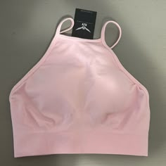 High Neck, Baby Pink Sports Bra Never Worn, Tags Still On! Spring Crop Top With Built-in Bra For Gym, Sports Bra With Built-in Bra For Training In Spring, Stretch Sports Bra For Spring Workout, Spring Training Sports Bra With Built-in Bra, Spring Workout Sports Bra With Stretch, Spring Training Sports Bra, Spring Workout Stretch Sports Bra, Spring Seamless Sports Bra With Medium Support, Seamless Sports Bra With Medium Support For Spring