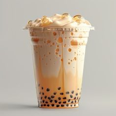 an iced drink in a plastic cup with whipped cream and caramel toppings on top