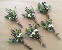 six small bouquets of lavender and white flowers