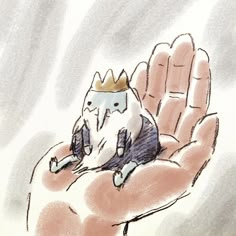 a drawing of a hand holding a cat wearing a crown