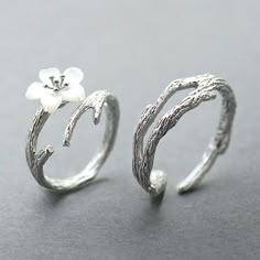 Discover our stunning Adjustable Size Matching Wedding Bands for Men and Women. Crafted in sterling silver, these Cherry Blossom Rings symbolize enduring love. Embrace the beauty of blossoming love with this elegant set, perfectly tailored to fit you both. Mentioned price is for a pair of jewelry items i.e. 1 Men's Ring and 1 Women's Ring ##################### It is an open ended adjustable size rings set, you can adjust ring size as per your finger size. ##################### -------- WHAT TO EXPECT -------- - We dispatch all jewelry items in an exquisite Jewelry Gift Box + Jewelry Cleaning Cloth + Gift Card -------- ITEM DETAILS -------- Material: White Gold Plated Sterling Silver (All of our jewelry items are anti-allergic and never rust) Promise Rings Sterling Silver, Birthday Gifts For Couples, Cherry Blossom Ring, Wedding Bands For Men, Matching Promise Rings, Cute Promise Rings, Matching Couple Rings, Rings For Couples, Promise Rings For Couples