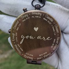 a pocket watch with the words you are written on it