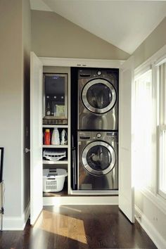 a washer and dryer in a small room