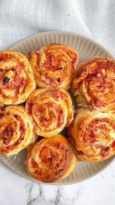 a plate filled with different types of pastries