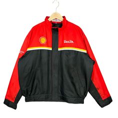 Shell Ferrari Zip Up Track Staff F1 Jacket * Made in : Japan * Size on Label : L * Manual Measurement (inch) : Chest 26, Length 26, Shoulder 21.5, Sleeve 23, Hem 20. * Material : Polyester, Nylon. * Colour : Black, Red. * Condition : Excellent except stain on shoulder (pen ink). * See photos for details. * Will be dry cleaning before shipping. * No Holes, No Tears, No Faded. NMB 1807 F1 Jacket, Vintage Surf, Windbreaker Jacket, Beige Color, Made In Japan, Ferrari, Black Red