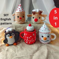 four crocheted mugs are sitting on a table with the words sew in front of them