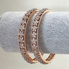 Set of 2 Rose Gold American Diamond Bangles(2PCS)/Bracelet/Indian Party Wear Bangles/CZ stone bangles/Indian wedding/bridal jewelry Ships from California in 1 business day Delivery in 2-5 business days in the USA Rose Gold Hand Set Bangle For Anniversary, Cubic Zirconia Bangle With Stone Work For Wedding, Wedding Bangle With Cubic Zirconia Stone Work, Wedding Cubic Zirconia Bangle With Stone Work, Festive Rose Gold Bangle Jewelry, Wedding Gold Bangle With Sparkling Stones, Rose Gold Wedding Bangle With Diamond Accents, Rose Gold American Diamond Jewelry For Wedding, Dazzling Rose Gold Wedding Bracelets