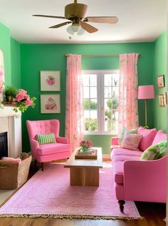 a living room with green walls and pink furniture