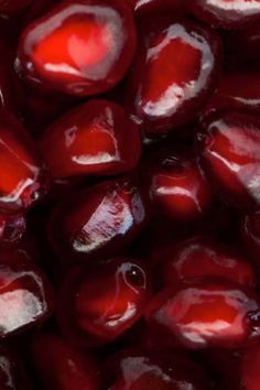 close up view of pomegranates in red