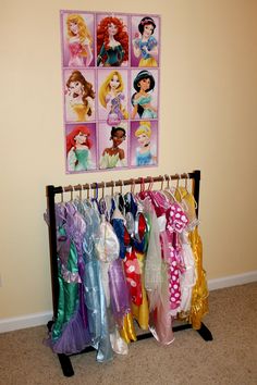 there are many princesses hanging on the wall