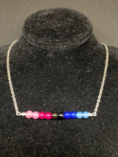 Genuine 4mm multicolored jade beads set on jewelry wire come together to create the Omnisexual Pride Flag Chain is stainless steel and is 18 inches in length. CAN BE MADE LONGER, PLEASE MESSAGE ME! Omnisexual Jewelry, Genderfluid Jewelry, Pride Stuff, Jewelry Wire, Pride Flag, Jade Beads, Pride Flags, Bar Necklace, Chain Styles