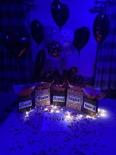 balloons and confetti are on the table for someone's 30th birthday party