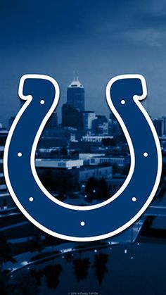 the indianapolis colts logo is shown in front of a cityscape