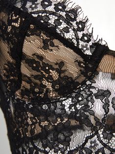 Details This corset-like top is crafted from rich romantic lace with slender strechy straps. It is essential for a sultry night spent with someone special! Body: 55% cotton, 45% nylon Contrast: 92% polyester, 8% spandex Lining 1: 100% nylon Lining 2: 100% polyester Dry clean Size & Fit Size Cup S 70A/70B/70C/75A M 70D/75B/75C/80A L 75D/80B/80C/85A Shipping & Return Free US shipping on orders over $100.Free International shipping on orders over $300. For more details click HERE. Elegant Lace Corset With Lace Closure, Fitted Delicate Lace Corset, Elegant Black Lace Top With Built-in Bra, Fitted Lace Camisole With Built-in Bra, Lace Corset With Sweetheart Neckline And Built-in Bra, Party Camisole With Sweetheart Neckline And Built-in Bra, Delicate Lace Fitted Corset, Delicate Lace Fitted Bodice Corset, Sweetheart Neckline Lace Corset