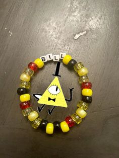 Funny Braclet Ideas, Bill Cipher Bracelet, Gravity Falls Bracelet Ideas, Gravity Falls Bracelet, Gravity Falls Kandi, Kandi Ideas Bracelets, Dsmp Bracelets, Character Bracelets, Kandi Cuff Patterns