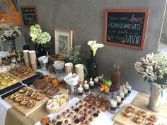 a table filled with lots of food and drinks